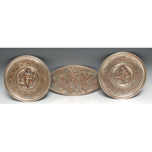 A pair of Elkington circular silvered metal wall plaques, em...