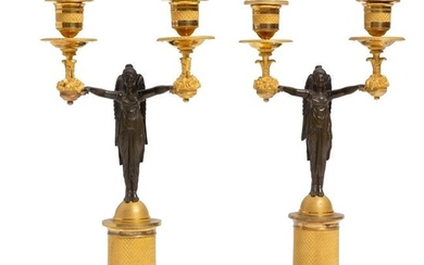 A pair of Empire bronze figural candelabra