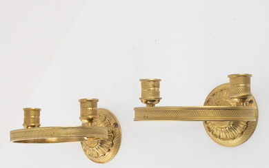 A pair of Empire-style gilt bronze two-light wall lights, 20th century.