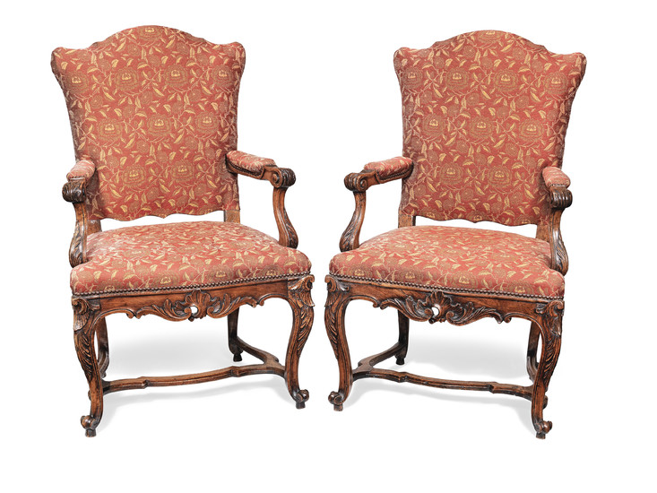 A pair of French 19th century walnut fauteuils