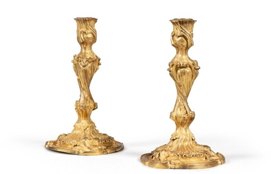 A pair of Louis XV gilt-bronze candlesticks, marked with the C couronné poinçon | Paire de flambeaux en bronze doré Louis XV, marqués au C couronné