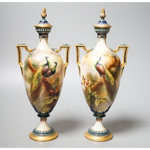 A pair of Royal Worcester Hadley ware Peacock vases and cove...