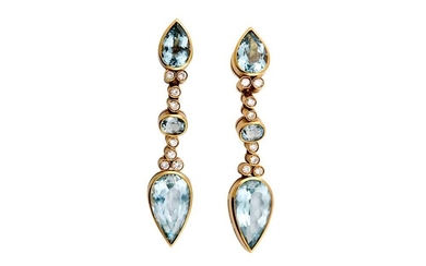 A pair of blue topaz and diamond earrings