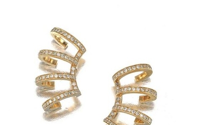 A pair of diamond cuff earrings