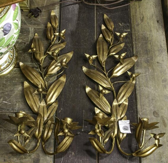 A pair of gilt patinated tole leaf form wall sconces