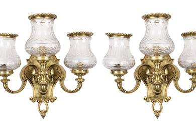A pair of glass and bronze wall lamps 20th C