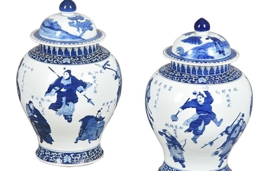 A pair of large Chinese blue and white jars and covers