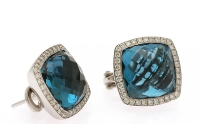 A pair of topaz and diamond ear pendants each set with a fancy-cut London Blue topaz encircled by numerous diamonds, mounted in 18k white gold. (2)