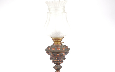 A patinated cast iron table lamp, the last part of the 19th century.
