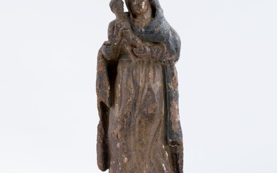 A polychrome wood sculpture of the Virgin and Child