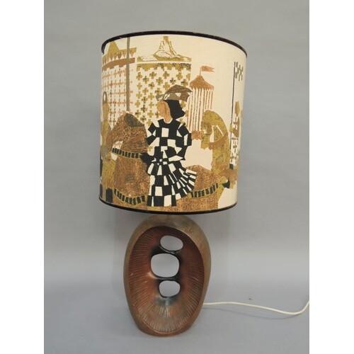 A pottery copper effect table lamp, ovoid with double-sided ...