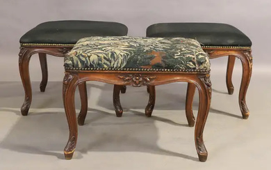 A set of three French walnut stools,19th century, one upholstered with an...
