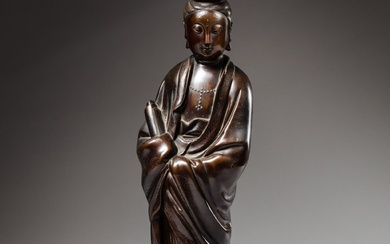 A silver-inlaid bronze figure of Guanyin, Qing dynasty, 18th -...