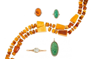 A small group of jewellery, comprising: a Russian, oval blue topaz single stone bar brooch, Soviet marks, length 5.1cm; an amber necklace composed of a series of tapered prismatic amber beads with single lines of vari-shaped amber beads between...