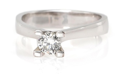 A solitaire diamond ring set with a brilliant-cut diamond weighing app. 0.50...