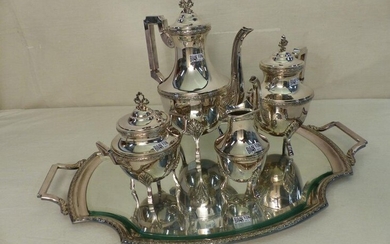 A tea and coffee set with a silver metal tray. Goldsmith Wiskemann.