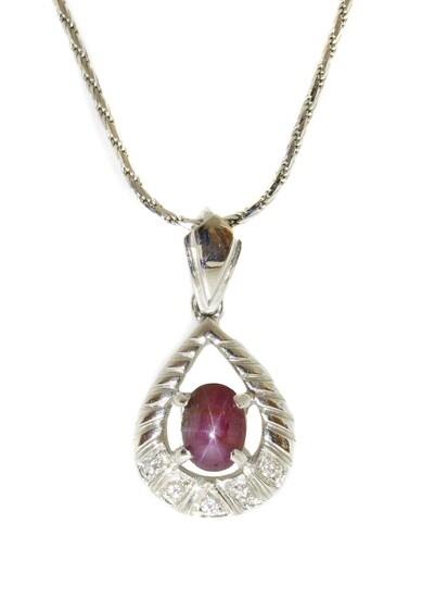 A white gold, star ruby and diamond pendant