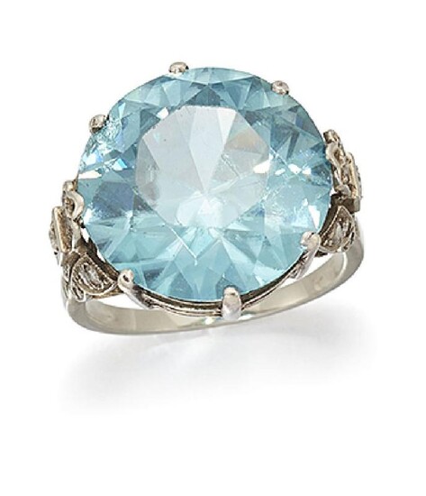 A zircon and diamond ring, the circular-cut...