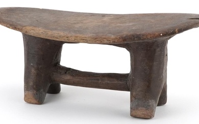 African tribal interest carved hardwood headrest, 30cm wide