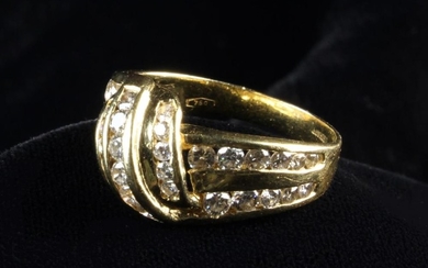 An 18 Carat Yellow Gold & Diamond Knot Ring. The head and shoulders set with a total of 39 round bri