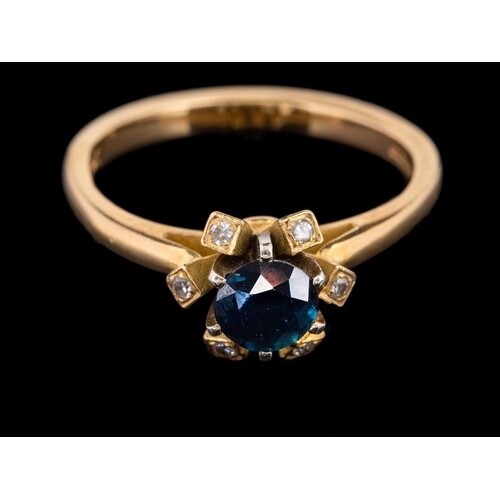 An 18 carat gold sapphire and diamond ring,: the circular cu...