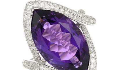 An 18ct gold amethyst, sapphire and brilliant-cut diamond dress ring.