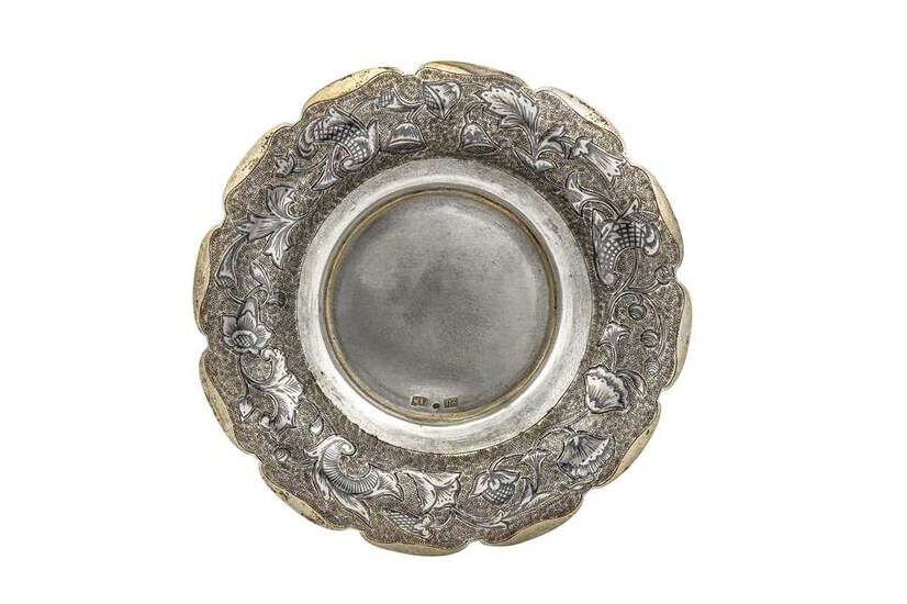 An Alexander II Russian provincial parcel gilt and niello 84 zolotnik (875 standard) silver saucer, circa 1860, makers mark obscured possibly MK