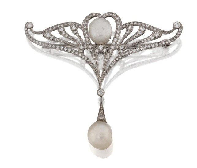 An Art Nouveau platinum, pearl and diamond brooch, designed as a fan-shaped stylised winged openwork panel set throughout with old-brilliant-cut diamonds, with central single pearl measuring approximately 10.8mm x 9.4mm, suspending a single pearl...