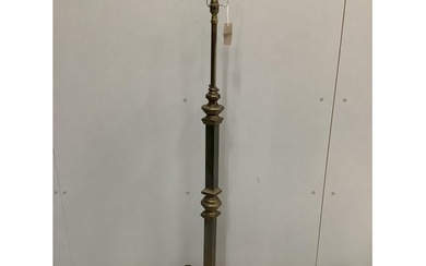 An Arts and Crafts style brass telescopic standard lamp...