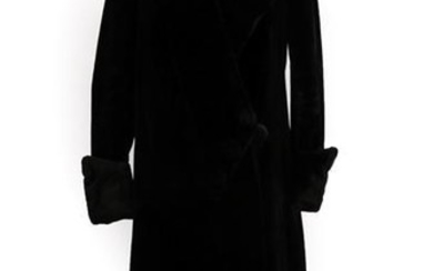 An Early 20th Century Black Evening Coat, with collar, fold...
