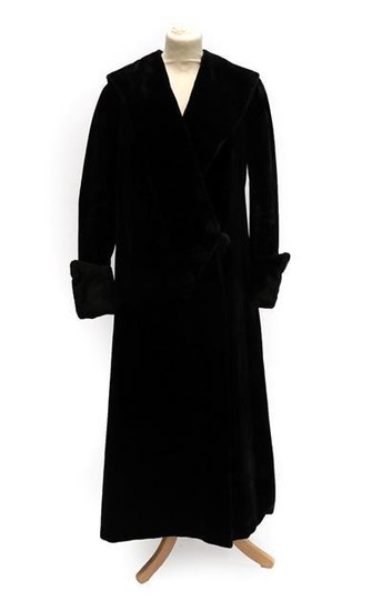 An Early 20th Century Black Evening Coat, with collar, fold...