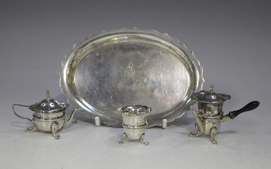 An Edwardian silver four-piece toy tea set, comprising teapot and cover, hot water pot and cover wit