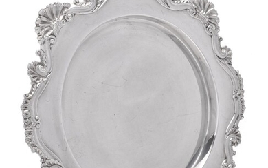 An Edwardian silver shaped circular salver by James Dixon & Sons Ltd.