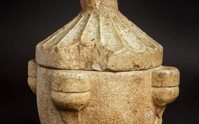 An Italian, late Romanesque, lidded holy water font
