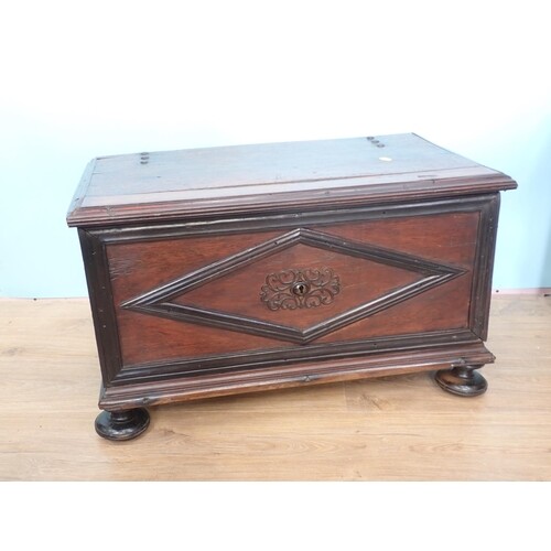 An antique hardwood Blanket Chest with moulded panels mounte...