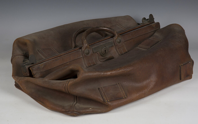 An early 20th century brown leather Gladstone bag, width 66cm.