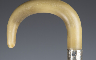 An early 20th century hardwood rhino horn handled walking stick with silver collar, London 1924, len