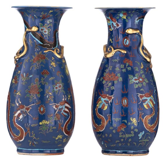An exceptional pair of Chinese blue ground 'Dragon'...