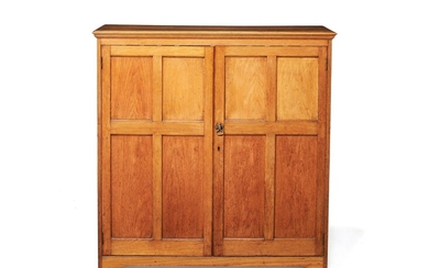 An oak shoe cupboard
