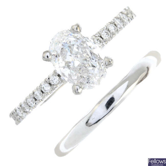An oval-shape fracture-filled diamond single-stone ring and a polished band ring.