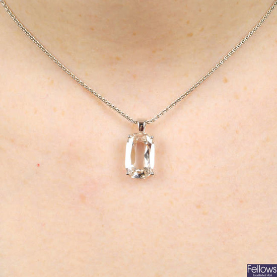 An unusual oval-shape diamond single-stone pendant
