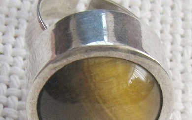 Art deco silver sterling ring set with tiger’s eye, size 7, signed by maker, adjustable.