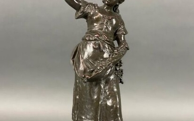 Auguste Moreau, (French, 1834 ~1917) "Fille de Ferme" bronze of a young farm girl carrying fruit with a basket by her side, on marble base. Signed Auguste Moreau. Height 33cm, Width 14cm.