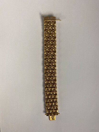 Bracelet à maille articulée en or jaune 18K... - Lot 48 - SGL Enchères - Frédéric Laurent de Rummel et Peggy Savidan
