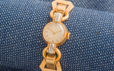 Bracelet montre de dame en or jaune 18 carats... - Lot 48 - Pestel-Debord