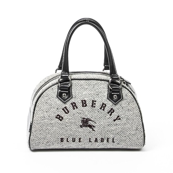SOLD. Burberry: A handbag made of grey and white wool with black leather trimmings, silver tone hardware and one zipped compartment. – Bruun Rasmussen Auctioneers of Fine Art