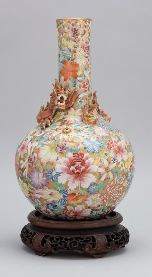CHINESE PORCELAIN VASE Thousand Flower decoration. Applied dragon at shoulder. Drilled through seal mark on base. Height 13.75". Wit...