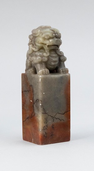 CHINESE SHOUSHAN STONE SEAL Top carved with guardian lion. Base cut with four-character seal. Height 5".