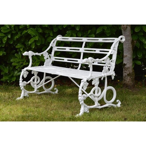Cast iron garden bench in the Coalbrookdale style with grape...