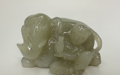 Celadon jade boy with vase and elephant
